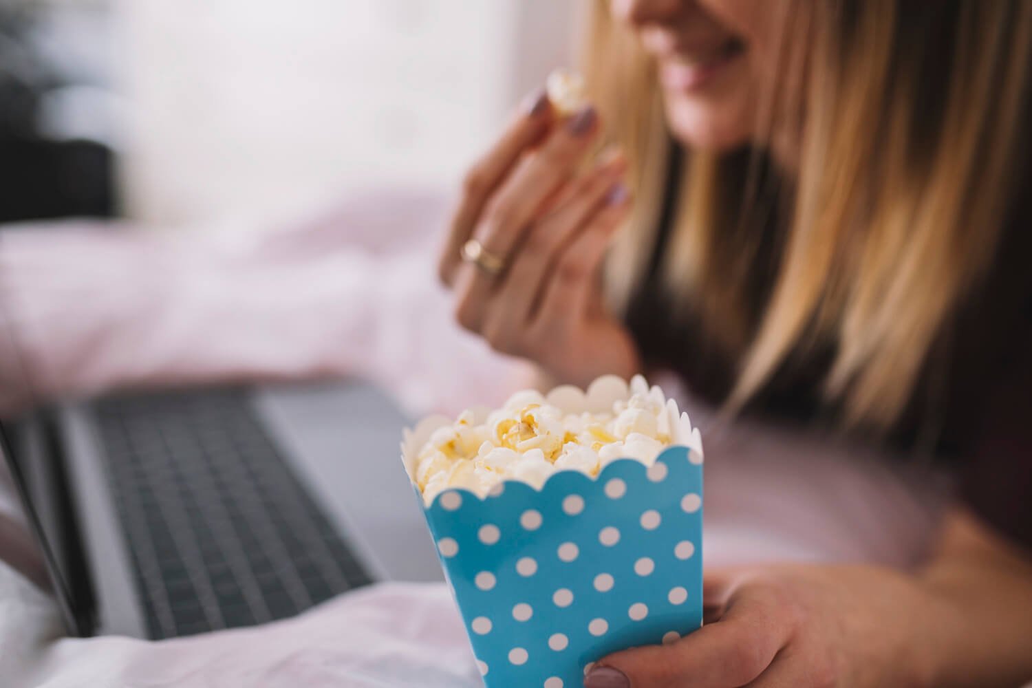 a girl with diabetes eating popcorn